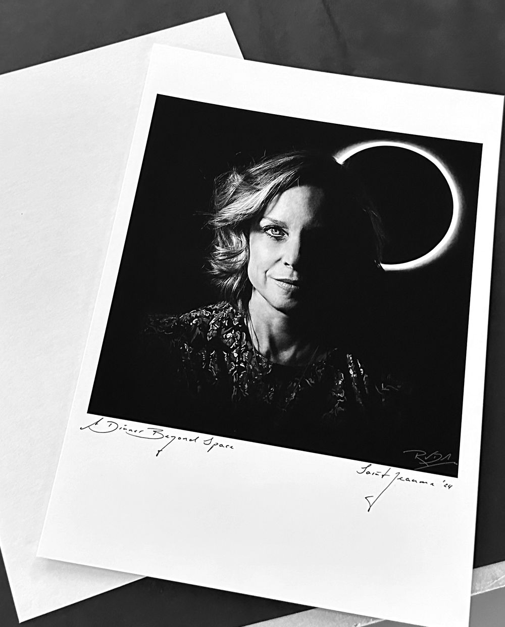 A guest's portrait, printed, signed and titled, ready to be sent two months after the dinner